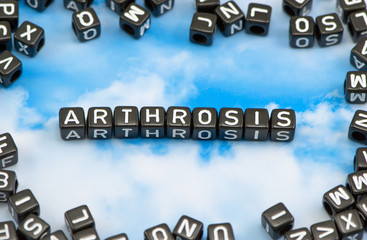 The word arthrosis on the sky background