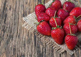 strawberries on old wooden background