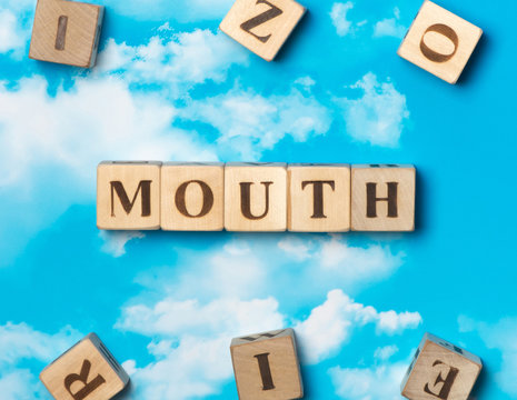 The word Mouth on the sky background