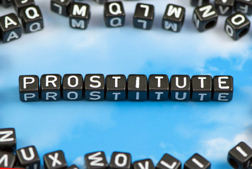 The word prostitute on the sky background