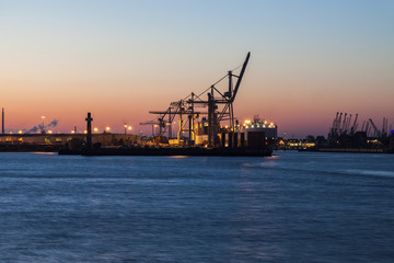 Fototapeta na wymiar Port of Hamburg at sunset