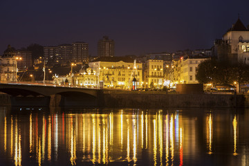Fototapeta na wymiar Panorama of Coimbra across Mondego River