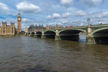 Fototapeta premium LONDON, ENGLAND - JUNE 19 2016: Cityscape of Westminster Palace and Thames River, London, England, United Kingdom