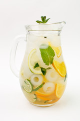 Beautiful fruit lemonade in a jar on a white background