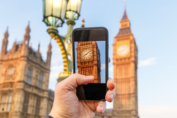 Taking and posting photo of Big ben in winter morning