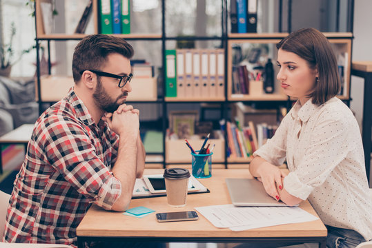 Portrait Of Two Sad Managers Failing Serious Business Project