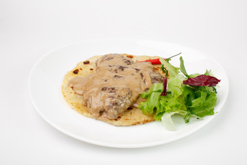 Beautiful meat dish on a white background