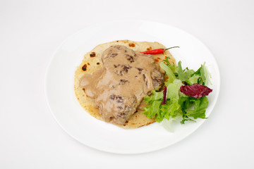 Beautiful meat dish on a white background