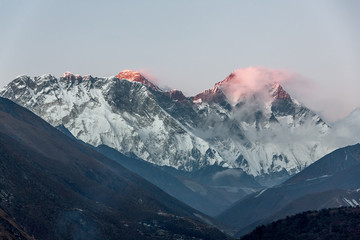 Mount Everest (8848 m) and Lhotse (8511 m) in the last light of the Sun (view from Tengboche...