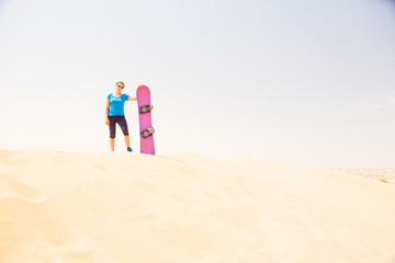 Tourist Sand Skiing In The Desert