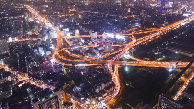 Timelapse of Bangkok city night view with main traffic high way,Thailand