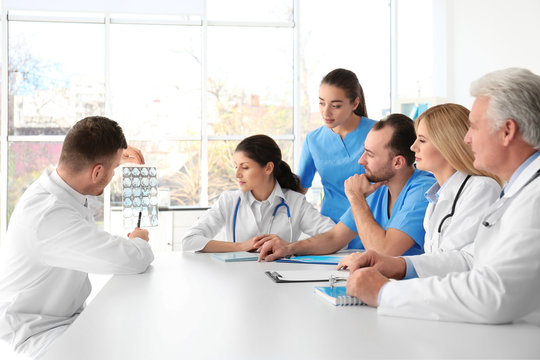 Team of doctors having meeting at clinic