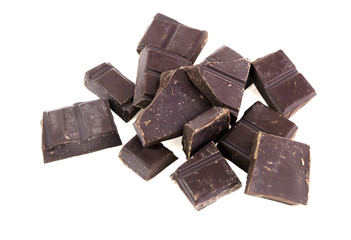 Chunks of milk chocolate. Isolated.