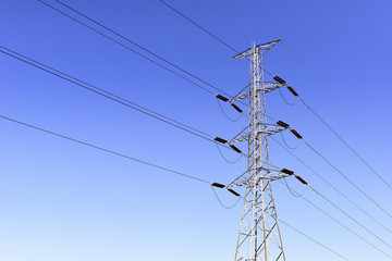 The electricity pylon with the blue sky 