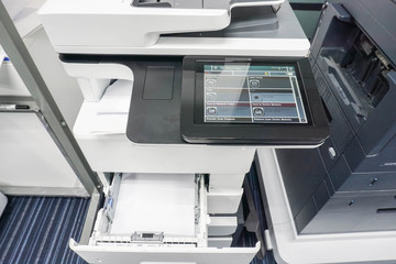 multifunction printer full with paper sheet in tray for printing