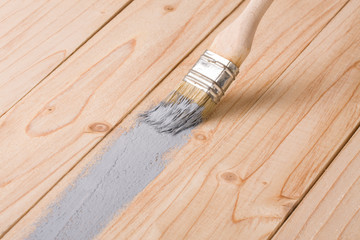 painting wooden board paint brush gray color