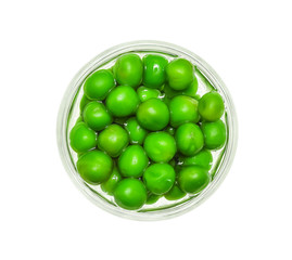 Canned peas in a mini glass bowl isolated on white background, Top view