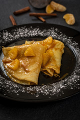 Pancakes with oranges