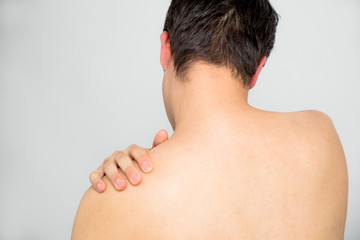 young man's neck and shoulders back view