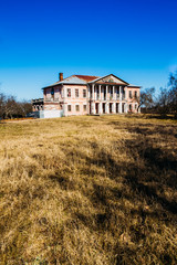 Landscape of countryside with the old manor