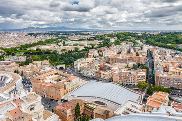Cloudy view of Vatican and Rome from the top of the dome of St Peter's Basilica, Lazio region, Italy.