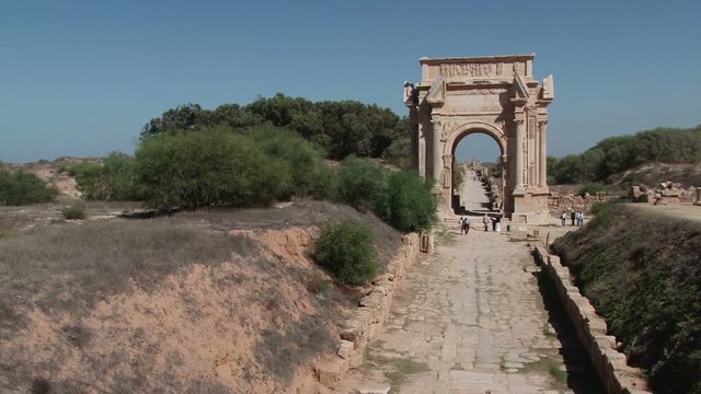 Wide shot of the Arch of Septimius Severus in Leptis Magna the extensive Roman ruins near Al Homs, Libya