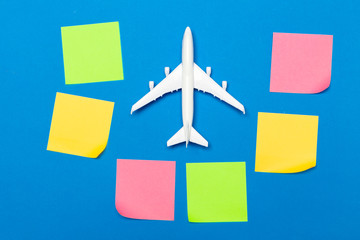 model of passenger plane on blue background