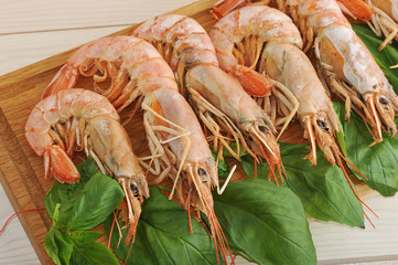 background of the large prawns and Basil leaves