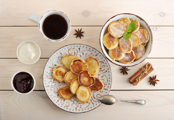 tea party with crumpets, cream and jam