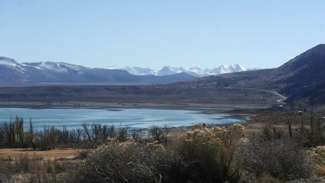 Timelapse of the lake and mountains, in autumn, at Mono lake, in California, United states of America