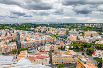 Cloudy view of Vatican and Rome from the top of the dome of St Peter's Basilica, Lazio region, Italy.