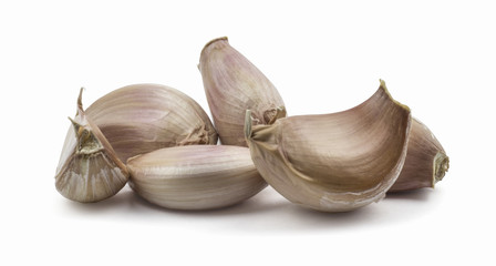Garlic pieces isolated on white background. Clipping path included in JPEG.