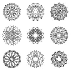 Set of mandalas. Vector geometric symbols. Black and white patterns.