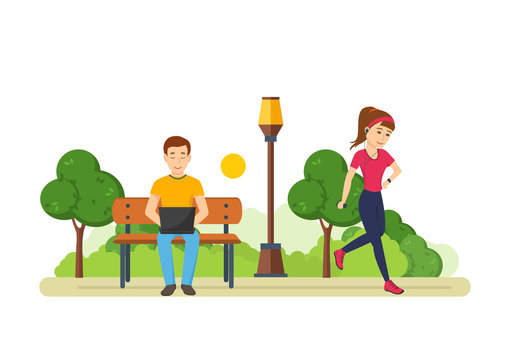 Guy behind laptop on bench in park, girl engaged athletics