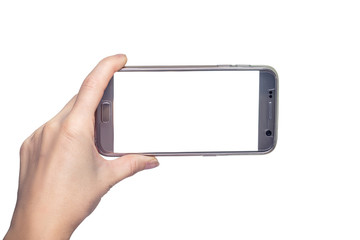 Female hand holding mobile smart phone with blank screen