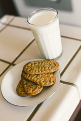 Milk and cookie, biscuits at the kitchen. Healthy meal, breakfast