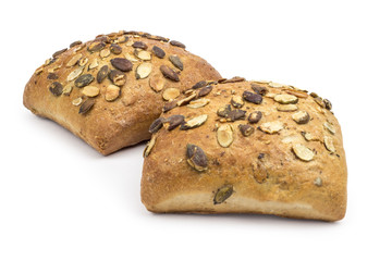 Rustic, organic bread with pumpkin seeds. Clipping path included in JPEG.