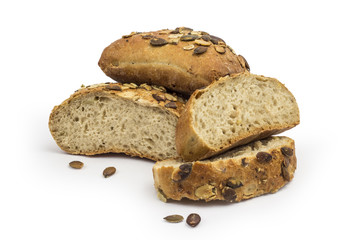 Rustic, organic bread with pumpkin seeds. Clipping path included in JPEG.