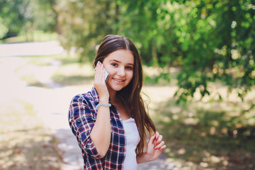 Fototapeta premium young beautiful girl walking park
