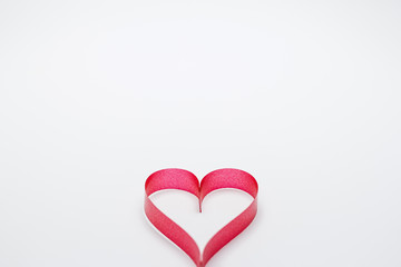 Ribbons shaped as hearts on white background, valentine's day.