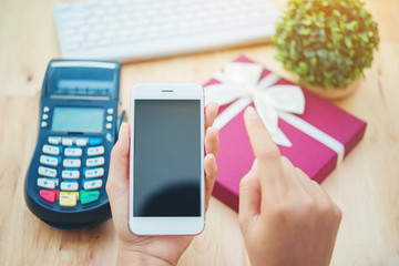 Woman using mobile payment