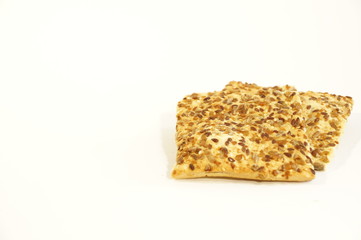 
Dietary cookies with sesame seeds, flax and sunflower isolated on white background