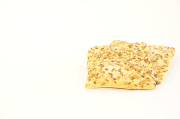 
Dietary cookies with sesame seeds, flax and sunflower isolated on white background