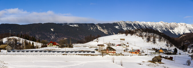 Winter Panorama with Piatra Craiului Mountains, Romania.