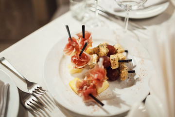 Black sticks with salted meat and cheese
