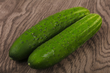 Two green cucumbers