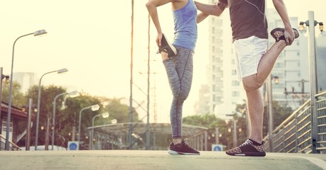 Fototapeta na wymiar Athletic Stretching Healthy Workout Sport Concept