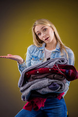 Woman choosing her fashion outfit. Shopping girl thinking what to wear