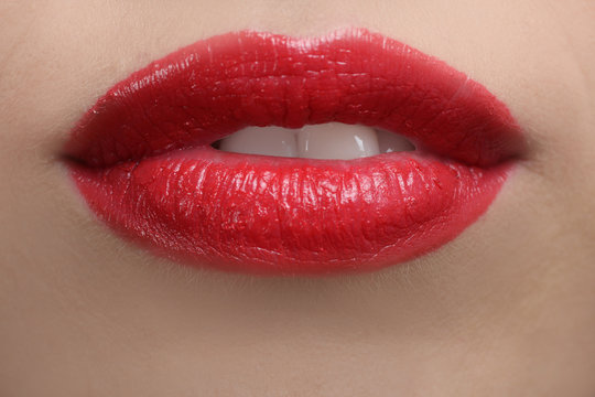 Makeup of a female lips. Close up