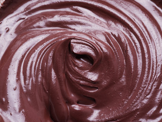 Melted chocolate or chocolate glaze.